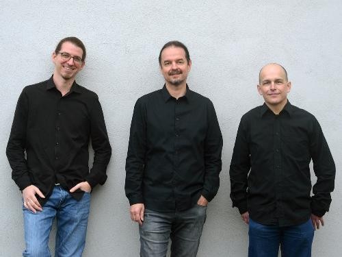 Drei Lehrer der Jugendmusikschule.