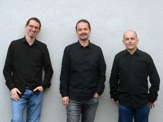 Drei Lehrer der Jugendmusikschule.